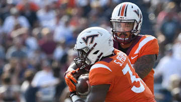 BLACKSBURG, VA - SEPTEMBER 22: Quarterback Josh Jackson #17 of the Virginia Tech Hokies hands the ball to running back Steven Peoples #32 in the first half against the Old Dominion Monarchs at S. B. Ballard Stadium on September 22, 2018 in Norfolk, Virginia. (Photo by Michael Shroyer/Getty Images)
