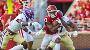 Sep 11, 2021; Norman, Oklahoma, USA; Oklahoma Sooners wide receiver Marvin Mims (17) runs past Western Carolina Catamounts safety Jacob Harris (3) during the first quarter at Gaylord Family-Oklahoma Memorial Stadium. Mandatory Credit: Kevin Jairaj-USA TODAY Sports