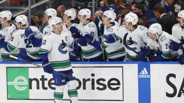 Dec 23, 2022; Edmonton, Alberta, CAN; The Vancouver Canucks celebrate a goal by forward Bo Horvat (53) during the third period against the Edmonton Oilers at Rogers Place. Mandatory Credit: Perry Nelson-USA TODAY Sports