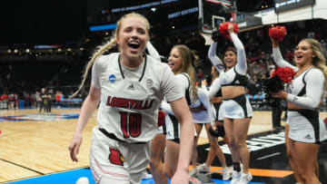 Mar 24, 2023; Seattle, WA, USA; Louisville Cardinals guard Hailey Van Lith (10) celebrates at the end of the game against the Ole Miss Rebels Climate Pledge Arena. Mandatory Credit: Kirby Lee-USA TODAY Sports