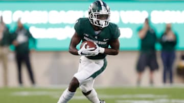 Sep 25, 2021; East Lansing, Michigan, USA; Michigan State Spartans wide receiver Jayden Reed (1) runs after a catch during the first quarter against the Nebraska Cornhuskers at Spartan Stadium. Mandatory Credit: Raj Mehta-USA TODAY Sports