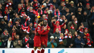 LIVERPOOL, ENGLAND - DECEMBER 10: Mohamed Salah of Liverpool celebrates scoring the first Liverpool goal with Sadio Mane of Liverpool during the Premier League match between Liverpool and Everton at Anfield on December 10, 2017 in Liverpool, England. (Photo by Clive Brunskill/Getty Images)