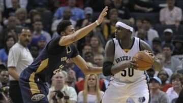Apr 8, 2015; Memphis, TN, USA; Memphis Grizzlies forward Zach Randolph (50) holds the ball as New Orleans Pelicans forward Anthony Davis (23) defends during the game at FedExForum. Mandatory Credit: Justin Ford-USA TODAY Sports