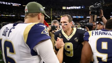 NEW ORLEANS, LA - NOVEMBER 04: Quarterback Jared Goff #16 of the Los Angeles Rams (L) shakes hands with quarterback Drew Brees #9 of the New Orleans Saints after the Saints defeated the Ram 45-35 in the game at Mercedes-Benz Superdome on November 4, 2018 in New Orleans, Louisiana. (Photo by Gregory Shamus/Getty Images)