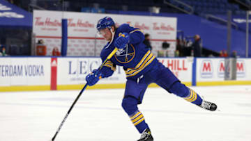 Jan 14, 2021; Buffalo, New York, USA; Buffalo Sabres center Jack Eichel (9) takes a shot on goal before a game against the Washington Capitals at KeyBank Center. Mandatory Credit: Timothy T. Ludwig-USA TODAY Sports