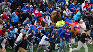 LAWRENCE, KANSAS - OCTOBER 28: Kansas Jayhawks fans rush the field after defeating the Oklahoma Sooners at David Booth Kansas Memorial Stadium on October 28, 2023 in Lawrence, Kansas. (Photo by Jay Biggerstaff/Getty Images)
