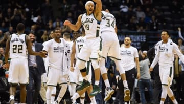 Feb 29, 2016; Milwaukee, WI, USA; Milwaukee Bucks guard Jerryd Bayless (19) celebrates with forward Giannis Antetokounmpo (34) after hitting a 3-point basket in the fourth quarter during the game against the Houston Rockets at BMO Harris Bradley Center. The Bucks beat the Rockets 128-121. Mandatory Credit: Benny Sieu-USA TODAY Sports