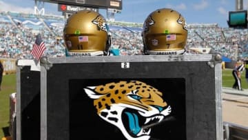 Dec 22, 2013; Jacksonville, FL, USA; Jacksonville Jaguars helmets of quarterback Blaine Gabbert (11) and quarterback Chad Henne (7) against the Tennessee Titans during the first half at EverBank Field. Mandatory Credit: Kim Klement-USA TODAY Sports
