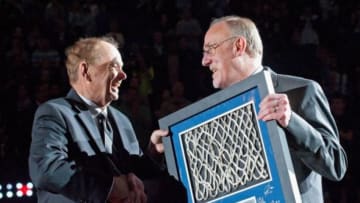Apr 13, 2013; Minneapolis, MN, USA; Minnesota Timberwolves owner Glen Taylor presents head coach Rick Adelman with a signed plaque honoring Adelman