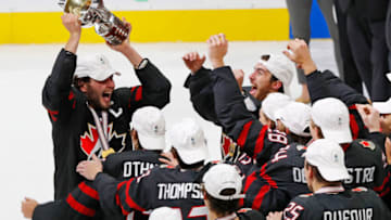 Aug 20, 2022; Edmonton, Alberta, CAN; Team Canada forward Mason MacTavish (23) celebrates with the World Junior Championship trophy after winning the championship game during the IIHF U20 Ice Hockey World Championship at Rogers Place. Mandatory Credit: Perry Nelson-USA TODAY Sports