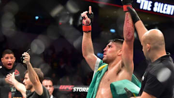 Aug 10, 2019; Montevideo, Uruguay; Vicente Luque (red gloves) reacts to fight against Mike Perry (blue gloves) during UFC Fight Night at Antel Arena. Mandatory Credit: Jason Silva-USA TODAY Sports
