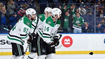 ST. LOUIS, MO - MARCH 2: Jamie Benn #14 of the Dallas Stars is congratulated by teammates after recording a hat trick against the St. Louis Blues at Enterprise Center on March 2, 2019 in St. Louis, Missouri. (Photo by Joe Puetz/NHLI via Getty Images)