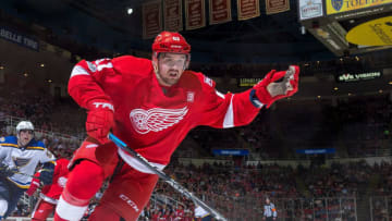 DETROIT, MI - FEBRUARY 15: Xavier Ouellet #61 of the Detroit Red Wings follows the play against the St. Louis Blues during an NHL game at Joe Louis Arena on February 15, 2017 in Detroit, Michigan. The Blues defeated the Wings 2-1. (Photo by Dave Reginek/NHLI via Getty Images)