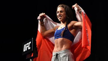 TORONTO, CANADA - DECEMBER 07: Joanna Jedrzejczyk of Poland poses on the scale during the UFC 231 weigh-in at Scotiabank Arena on December 7, 2018 in Toronto, Canada. (Photo by Jeff Bottari/Zuffa LLC/Zuffa LLC via Getty Images)