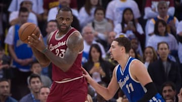 December 25, 2015; Oakland, CA, USA; Cleveland Cavaliers forward LeBron James (23) controls the basketball against Golden State Warriors guard Klay Thompson (11) during the fourth quarter in a NBA basketball game on Christmas at Oracle Arena. The Warriors defeated the Cavaliers 89-83. Mandatory Credit: Kyle Terada-USA TODAY Sports