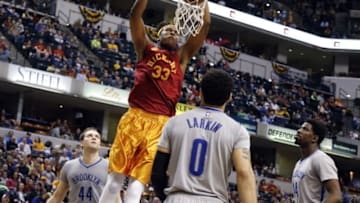Apr 10, 2016; Indianapolis, IN, USA; Indiana Pacers center Myles Turner (33) dunks against Brooklyn Nets guard Shane Larkin (0) at Bankers Life Fieldhouse. Indiana defeats Brooklyn 129-105. Mandatory Credit: Brian Spurlock-USA TODAY Sports