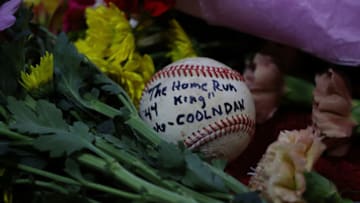 ATLANTA, GEORGIA - JANUARY 22: Fans pay tribute after the death of MLB Hall of Famer Hank Aaron at The Battery Atlanta on January 22, 2021 in Atlanta, Georgia. (Photo by Kevin C. Cox/Getty Images)
