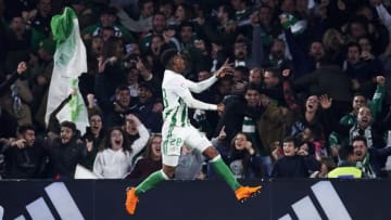 SEVILLE, SPAIN - FEBRUARY 18: Junior Firpo of Real Betis Balompie celebrates after Nacho Fernandez of Real Madrid scored an own goal during the La Liga match between Real Betis and Real Madrid at Benito Villamrin stadium on February 18, 2018 in Seville, Spain. (Photo by Aitor Alcalde/Getty Images)