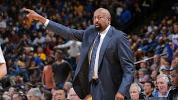 OAKLAND, CA - MARCH 30: Head Coach Mike Woodson of the New York Knicks coaches against the Golden State Warriors on March 30, 2014 at Oracle Arena in Oakland, California. Copyright 2014 NBAE (Photo by Rocky Widner/NBAE via Getty Images)