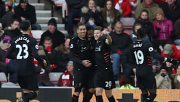 SUNDERLAND, ENGLAND - JANUARY 02: Daniel Sturridge of Liverpool (C) celebrates scoring his sides first goal with his Liverpool team mates during the Premier League match between Sunderland and Liverpool at Stadium of Light on January 2, 2017 in Sunderland, England. (Photo by Ian MacNicol/Getty Images)