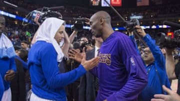 January 14, 2016; Oakland, CA, USA; Golden State Warriors guard Stephen Curry (30, left) shakes hands with Los Angeles Lakers forward Kobe Bryant (24, right) after the game at Oracle Arena. The Warriors defeated the Lakers 116-98. Mandatory Credit: Kyle Terada-USA TODAY Sports