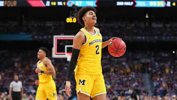 SAN ANTONIO, TX - MARCH 31: Jordan Poole #2 of the Michigan Wolverines reacts as time expires to defeat the Loyola Ramblers during the 2018 NCAA Men's Final Four Semifinal at the Alamodome on March 31, 2018 in San Antonio, Texas. Michigan defeated Loyola 69-57. (Photo by Tom Pennington/Getty Images)