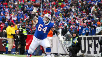 ORCHARD PARK, NY - DECEMBER 17: Richie Incognito #64 of the Buffalo Bills spikes the ball after LeSean McCoy #25 of the Buffalo Bills scored a touchdown during the first quarter against the Miami Dolphins on December 17, 2017 at New Era Field in Orchard Park, New York. (Photo by Tom Szczerbowski/Getty Images)