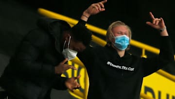 Erling Haaland celebrated Borussia Dortmund's win over RB Leipzig on Saturday from the stands (Photo by LEON KUEGELER/POOL/AFP via Getty Images)