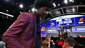 NEW YORK, NY - JUNE 22: Josh Jackson walks to the stage after being drafted fourth overall by the Phoenix Suns during the first round of the 2017 NBA Draft at Barclays Center on June 22, 2017 in New York City.
