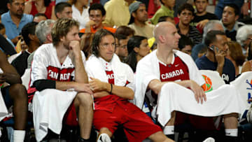SAN JUAN, PUERTO RICO - AUGUST 30: ***PUERTO RICO OUT, INTERNET OUT *** (L-R) Canadian players Jeffery Swords, Steven Nash and Gregory Newton watch the Olympic qualifying game between Canada and Argentina on August 30, 2003 at Roberto Clemente Coliseum in San Juan, Puerto Rico. Argentina defeated Canada 88-72. NOTE TO USER: User expressly acknowledges and agrees that, by downloading and or using this photograph, User is consenting to the terms and conditions of the Getty Images License Agreement. (Photo by Jose Jimenez/Primera Hora/Getty Images)