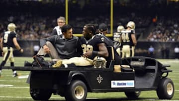 Nov 1, 2015; New Orleans, LA, USA; New Orleans Saints running back Khiry Robinson (29) is taken off the field after an injury during the second quarter of the game against the New York Giants at the Mercedes-Benz Superdome. Mandatory Credit: Matt Bush-USA TODAY Sports