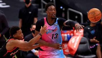 Bam Adebayo #13 of the Miami Heat passes away from Kyle Lowry #7(Photo by Mike Ehrmann/Getty Images)