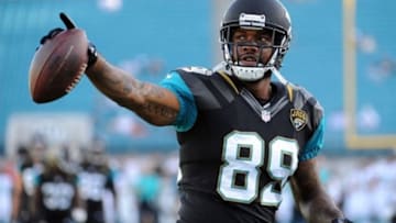 Aug 9, 2013; Jacksonville, FL, USA; Jacksonville Jaguars tight end Marcedes Lewis (89) warms up before the start of the game against the Miami Dolphins at Everbank Field. Mandatory Credit: Melina Vastola-USA TODAY Sports