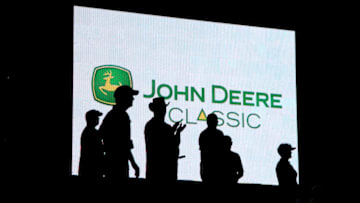 SILVIS, IL - AUGUST 13: Fans cheer on the 18th hole at the finish of the third round of the John Deere Classic at TPC Deere Run on August 13, 2016 in Silvis, Illinois. (Photo by Michael Cohen/Getty Images)