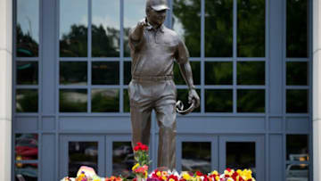Flowers collect at the feet of Bobby Bowden's statue outside Doak Campbell Stadium in the hours following his death Sunday, August 8, 2021.Bobby Bowden Statue 080821 Ts 060
