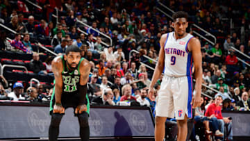 DETROIT, MI - DECEMBER 15: Kyrie Irving #11 of the Boston Celtics and Langston Galloway #9 of the Detroit Pistons look on during the game between the Boston Celtics and the Detroit Pistons on December 15, 2018 at Little Caesars Arena in Detroit, Michigan. NOTE TO USER: User expressly acknowledges and agrees that, by downloading and/or using this photograph, User is consenting to the terms and conditions of the Getty Images License Agreement. Mandatory Copyright Notice: Copyright 2018 NBAE (Photo by Chris Schwegler/NBAE via Getty Images)