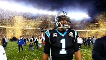 Feb 7, 2016; Santa Clara, CA, USA; Confetti falls as Carolina Panthers quarterback Cam Newton (1) reacts during his walk off the field following the game against the Denver Broncos during Super Bowl 50 at Levi