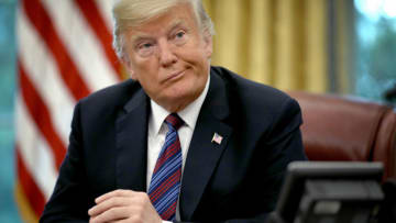 WASHINGTON, DC - AUGUST 27: U.S. President Donald Trump speaks on the telephone via speakerphone with Mexican President Enrique Pena Nieto in the Oval Office of the White House on August 27, 2018 in Washington, DC. Trump announced that the United States and Mexico have reached a preliminary agreement on trade. (Photo by Win McNamee/Getty Images)