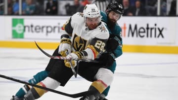 SAN JOSE, CA - APRIL 10: William Carrier #28 of the Vegas Golden Knights controls the puck keeping it away from Brent Burns #88 of the San Jose Sharks during the third period in Game One of the Western Conference First Round during the 2019 NHL Stanley Cup Playoffs at SAP Center on April 10, 2019 in San Jose, California. The Sharks won the game 5-2. (Photo by Thearon W. Henderson/Getty Images)