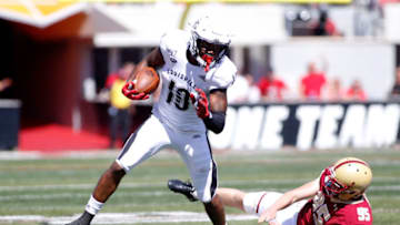 LOUISVILLE, KENTUCKY - OCTOBER 05: Javian Hawkins #10 of the Louisville Cardinals runs the ball in the game against the Boston College Eagles at Cardinal Stadium on October 05, 2019 in Louisville, Kentucky. (Photo by Justin Casterline/Getty Images)