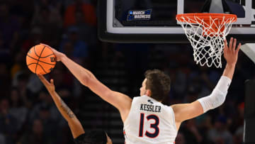 Mar 18, 2022; Greenville, SC, USA; Auburn Tigers forward Walker Kessler (13) blocks a shot by Jackson State Tigers forward Darius Hicks (1) during the first round of the 2022 NCAA Tournament at Bon Secours Wellness Arena. Mandatory Credit: Bob Donnan-USA TODAY Sports