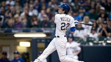 MILWAUKEE, WISCONSIN - MAY 24: Christian Yelich #22 of the Milwaukee Brewers hits a home run in the third inning against the Philadelphia Phillies at Miller Park on May 24, 2019 in Milwaukee, Wisconsin. (Photo by Dylan Buell/Getty Images)