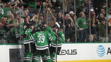 DALLAS, TX - DECEMBER 7: Mattias Janmark #13, Joel Hanley #39, Roman Polak #45 and the Dallas Stars celebrate a goal against the San Jose Sharks at the American Airlines Center on December 7, 2018 in Dallas, Texas. (Photo by Glenn James/NHLI via Getty Images)