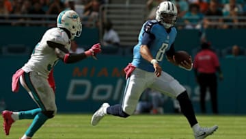 MIAMI GARDENS, FL - OCTOBER 09: Marcus Mariota #8 of the Tennessee Titans rushes during a game against the Miami Dolphins on October 9, 2016 in Miami Gardens, Florida. (Photo by Mike Ehrmann/Getty Images)