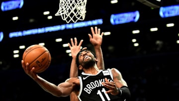 NEW YORK, NEW YORK - OCTOBER 23: Kyrie Irving #11 of the Brooklyn Nets goes in for a layup during the first half of their game against the Minnesota Timberwolves at Barclays Center on October 23, 2019 in the Brooklyn borough of New York City. NOTE TO USER: User expressly acknowledges and agrees that, by downloading and or using this photograph, User is consenting to the terms and conditions of the Getty Images License Agreement. (Photo by Emilee Chinn/Getty Images)