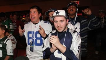 May 8, 2014; New York, NY, USA; Dallas Cowboys fans (from left) Karl Clemens and and Bret Hood and Patrick Thompson from New York and Jorge Espinosa from New Jersey react as the Dallas Cowboys select offensive tackle Zack Martin (Notre Dame) as the sixteenth overall pick in the first round of the 2014 NFL draft during the 2014 NFL draft at Radio City Music Hall. Mandatory Credit: Brad Penner-USA TODAY Sports