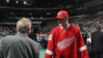 DALLAS, TX - JUNE 23: Ryan O'Reilly reacts after being selected 98th overall by the Detroit Red Wings during the 2018 NHL Draft at American Airlines Center on June 23, 2018 in Dallas, Texas. (Photo by Bruce Bennett/Getty Images)