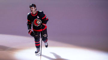 Oct 1, 2022; Ottawa, Ontario, CAN; Ottawa Senators right wing Alex DeBrincat (12) is named the first star of the game after scoring the winning goal in overtime against the Montreal Canadiens at the Canadian Tire Centre. Mandatory Credit: Marc DesRosiers-USA TODAY Sports