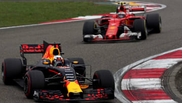 SHANGHAI, CHINA - APRIL 09: Daniel Ricciardo of Australia driving the (3) Red Bull Racing Red Bull-TAG Heuer RB13 TAG Heuer leads Kimi Raikkonen of Finland driving the (7) Scuderia Ferrari SF70H on track during the Formula One Grand Prix of China at Shanghai International Circuit on April 9, 2017 in Shanghai, China. (Photo by Lars Baron/Getty Images)