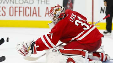 Oct 13, 2015; Raleigh, NC, USA; Carolina Hurricanes goalie Eddie Lack (31) makes a save during the 2nd period against the Florida Panthers at PNC Arena. Mandatory Credit: James Guillory-USA TODAY Sports